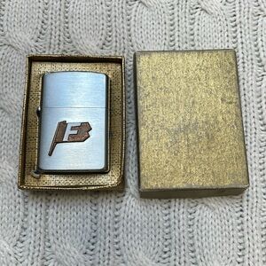 VTG Idealine butane lighter in original box. Silver. Flag with F on front. Japan